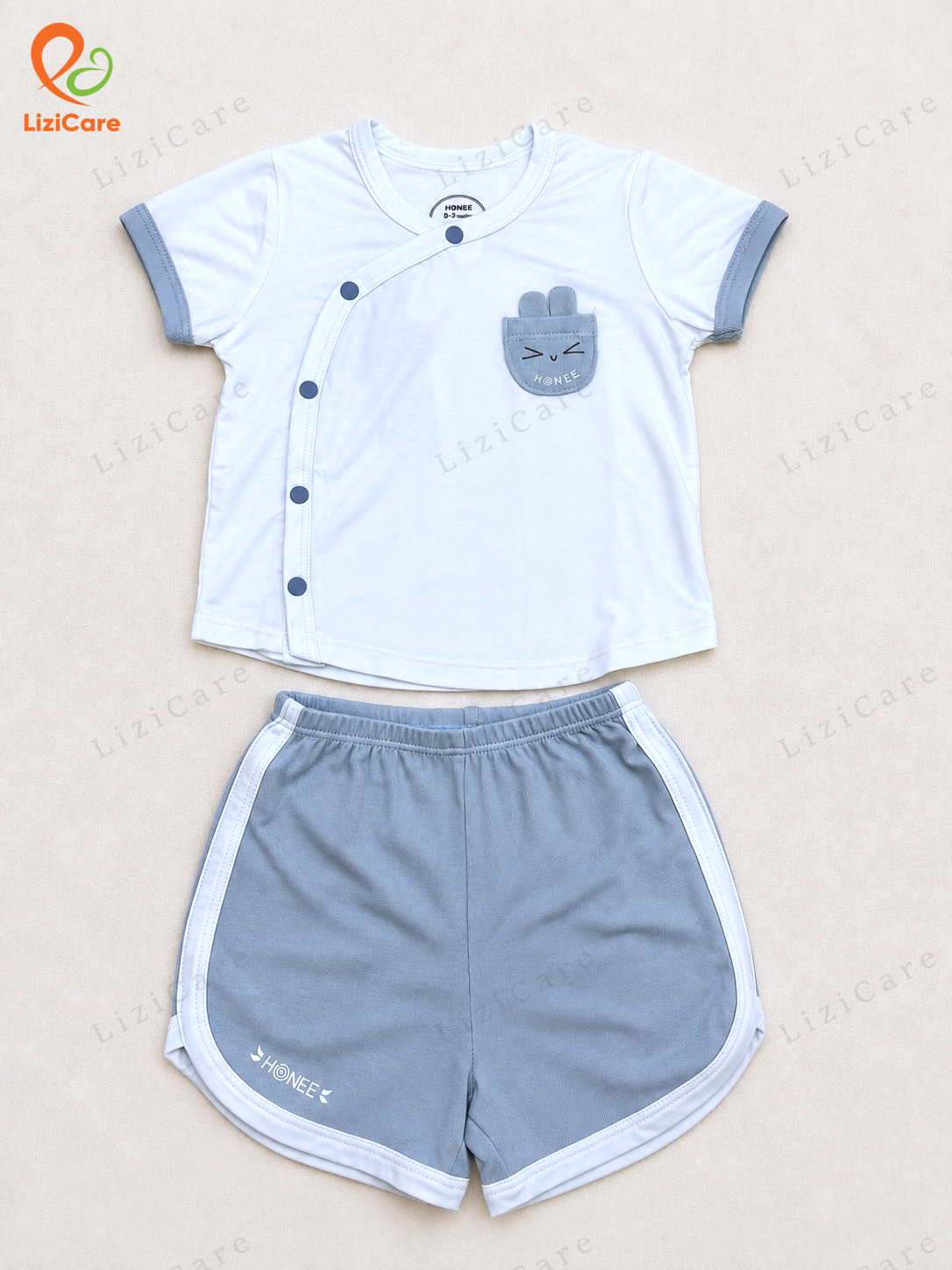 Bộ ss cộc túi gấu cài chéo Hrnee xanh pastel 6-9M