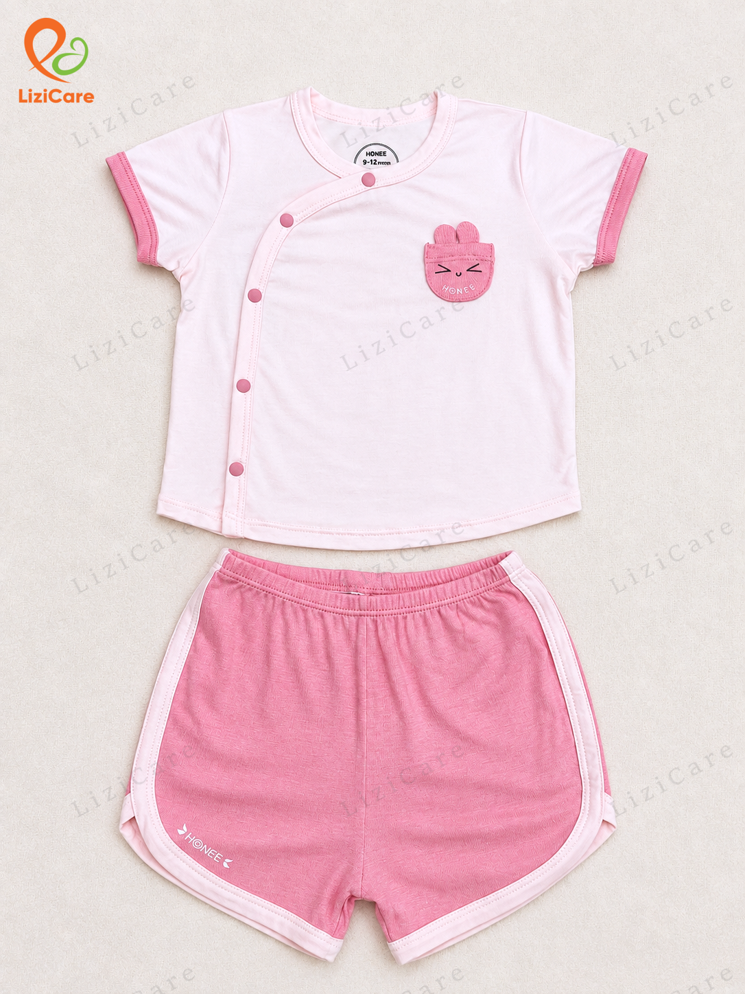 Bộ ss cộc túi gấu cài chéo Hrnee hồng pastel