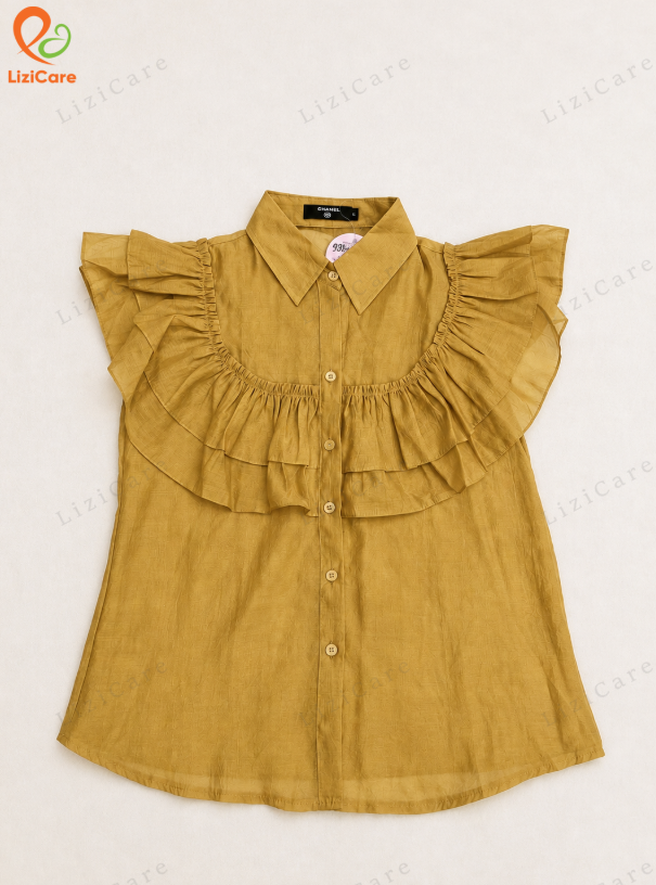 Áo sơ mi lụa tơ bèo ngực màu vàng size S